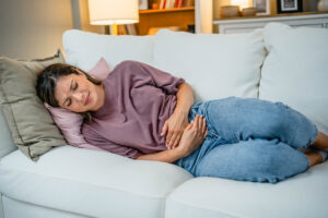 Woman suffering from bladder infection or UTI