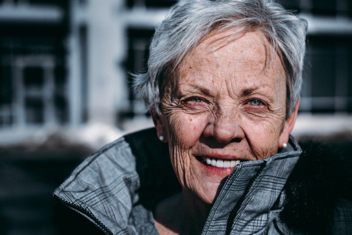 Stylish older woman smiles