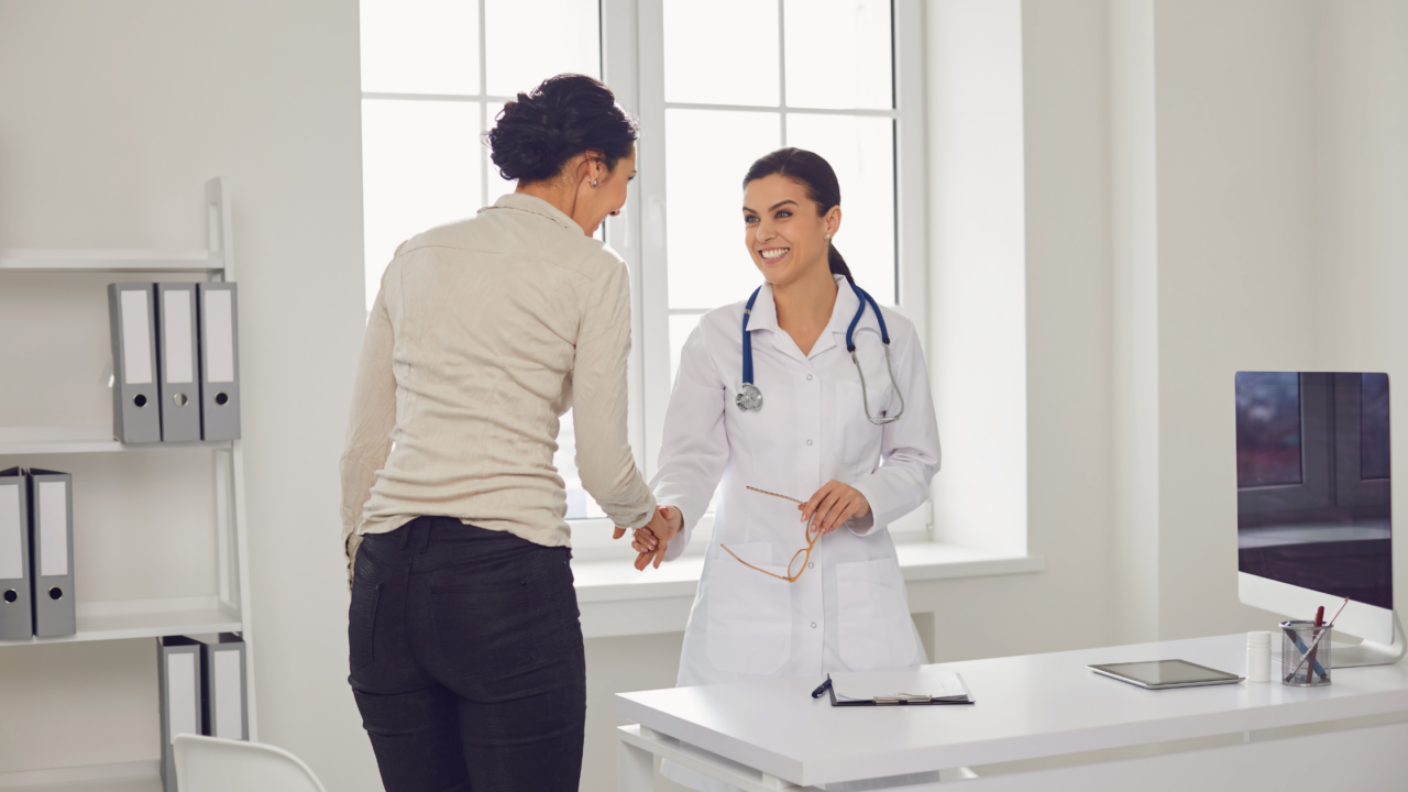 Women's Health Specialists - OBGYN Clinic - Doctor and Patient
