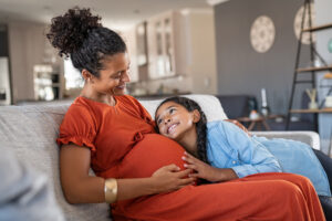 Pregnant mom & daughter - OBGYN Clinic - Women's Health Specialists